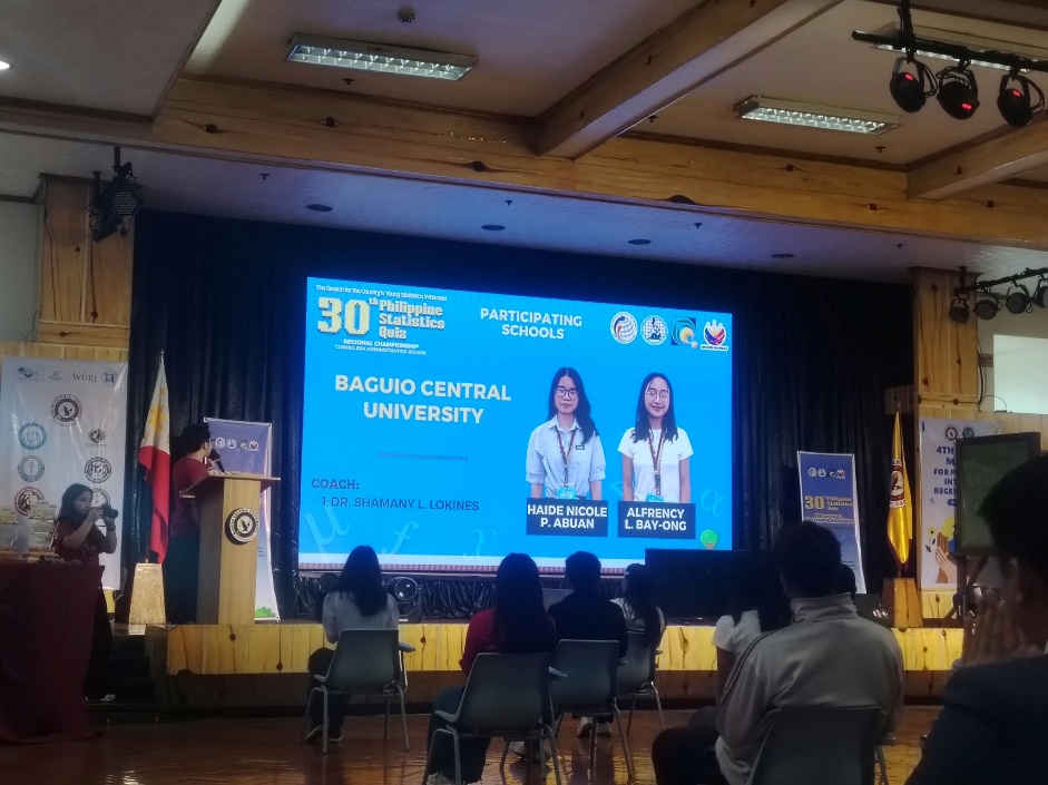 Presentation slide introducing BCU contestants Haidee Nicole P. Abuan and Alfrency L. Bay-ong at the 30th Philippine Statistics Quiz Regional Championship