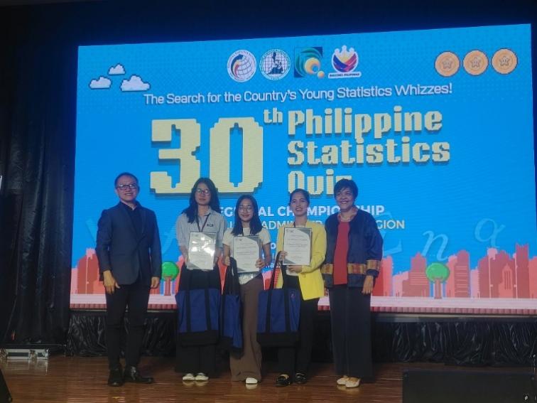 PSA-CAR officials present certificates to BCU representatives Abuan and Bay-ong and their coach Dr. Shamany L. Lokines