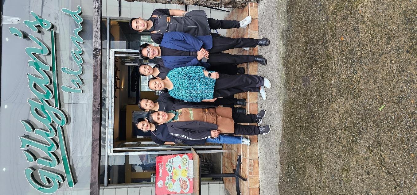 BCU-CHTM faculty and practicum students with Giligan’s Restaurants representatives